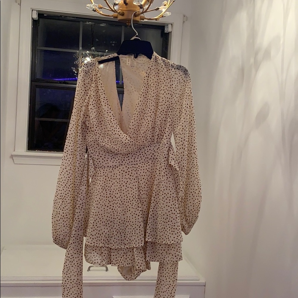 japna cream with brown polkadots